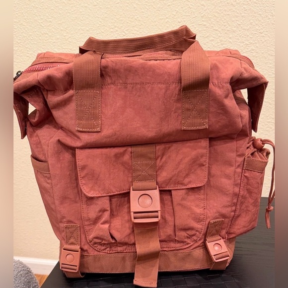 Tommy Bahama Handbags - Tommy Bahama Dark Dusty Pink
Terracotta Convertible Backpack Laptop
Bag